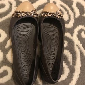 Black and Nude Crocs Flats